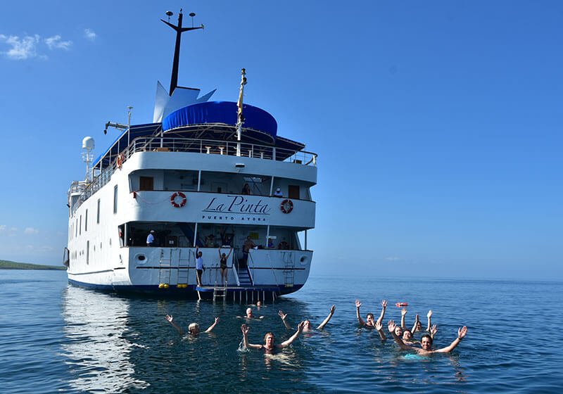 la pinta back with people in the sea