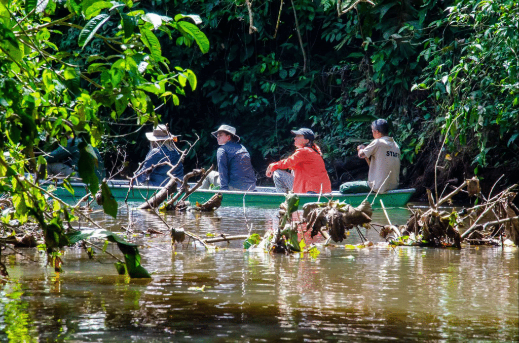 side view of canoe with people yarina lodge