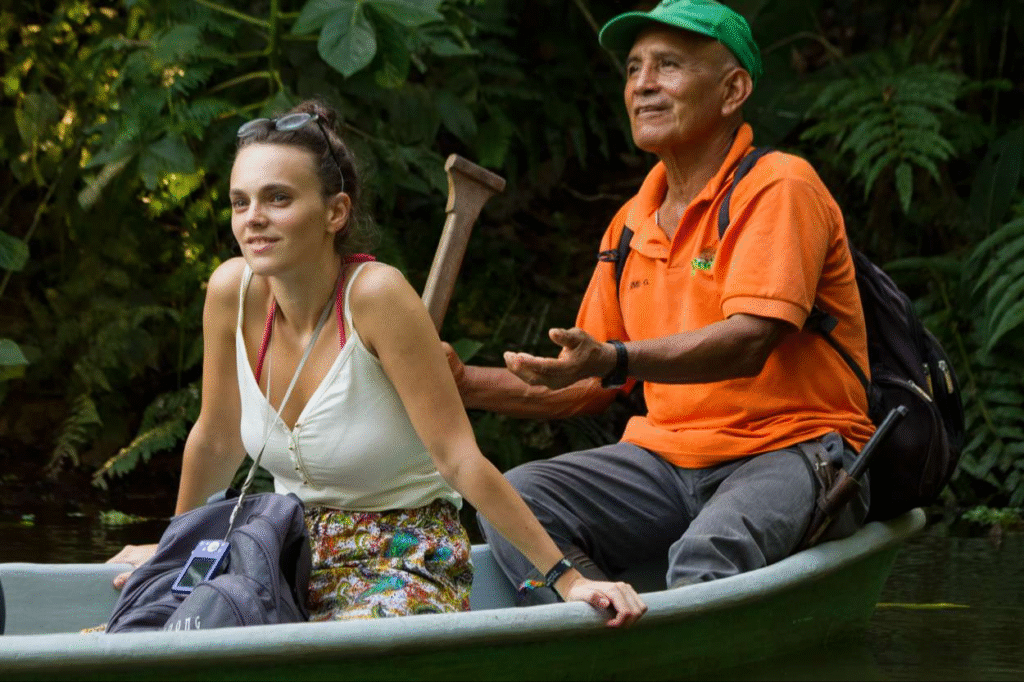 woman and guide in canoe yarina lodge